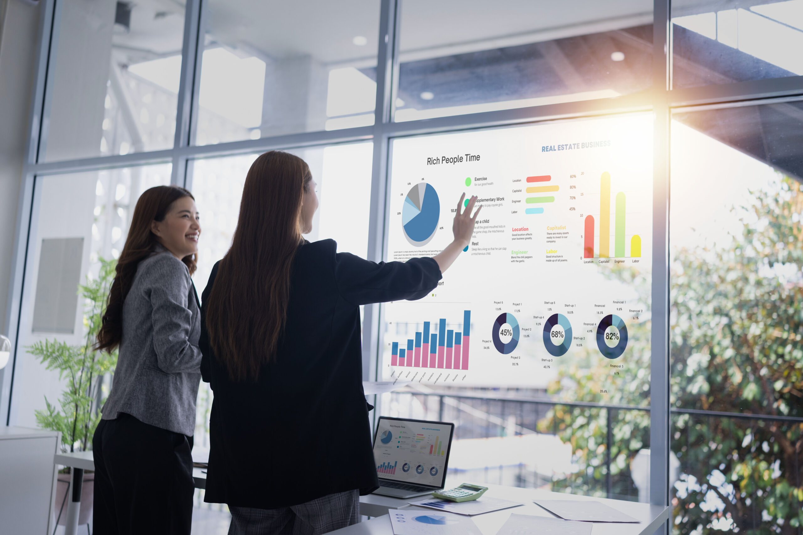 Two businesswoman presentation with marketing strategy analysis at meeting room, Business technology in boardroom for training marketing concept.